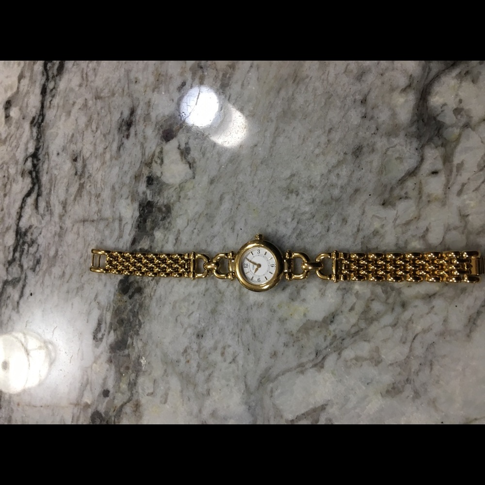 Gold plated authentic coach watch